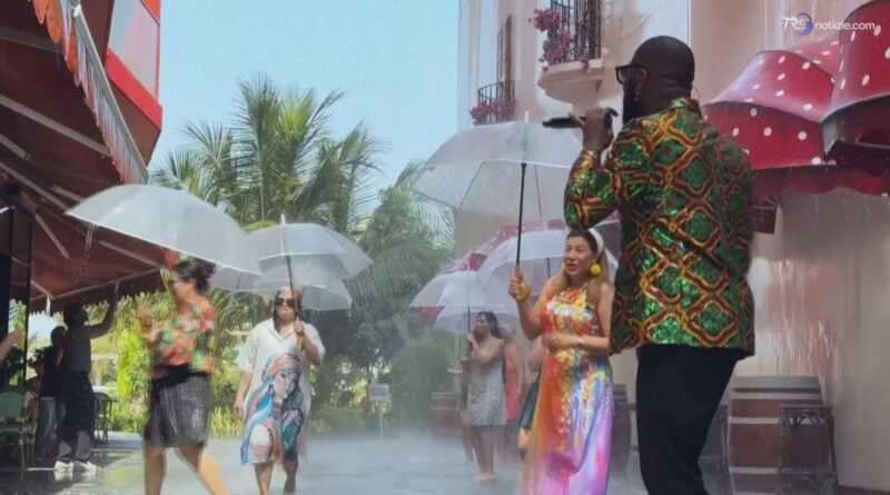 A Dubai arriva la "Raining Street": per sfuggire al caldo torrido pioggia scrosciante artificiale